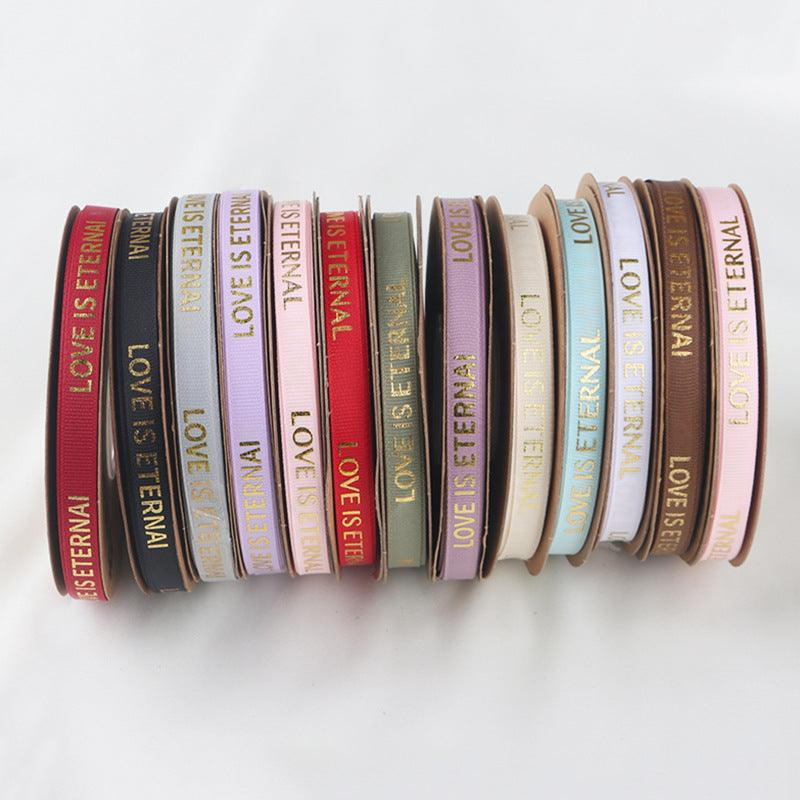 LR 1 cm Wide, 40-Yard Gold-Stamped Ribbed Ribbon