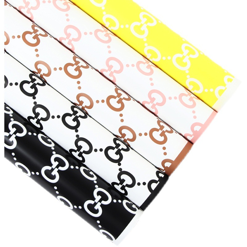 LR Guci Logo Floral Wrapping Paper Design