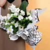 LR Guci Logo Floral Wrapping Paper Design