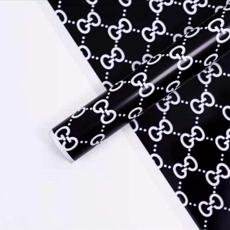 LR Guci Logo Floral Wrapping Paper Design