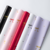 LR Flower Wrapping Paper with Heart-Shaped Knot Design