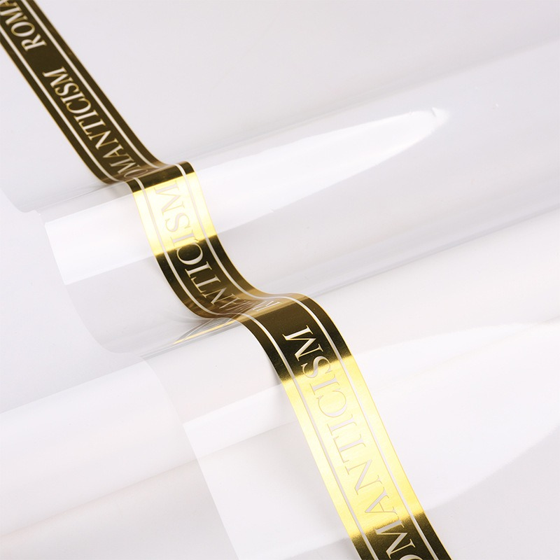 Minimalist Gold Letter & Floral Wrapping Paper