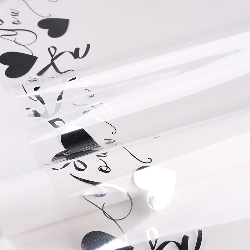 Minimalist Gold Letter & Floral Wrapping Paper
