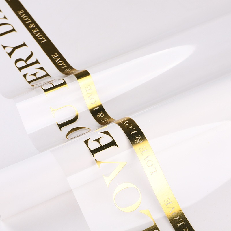 Minimalist Gold Letter & Floral Wrapping Paper