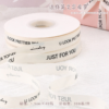 Popular off-white polyester-cotton ribbon with English lettering