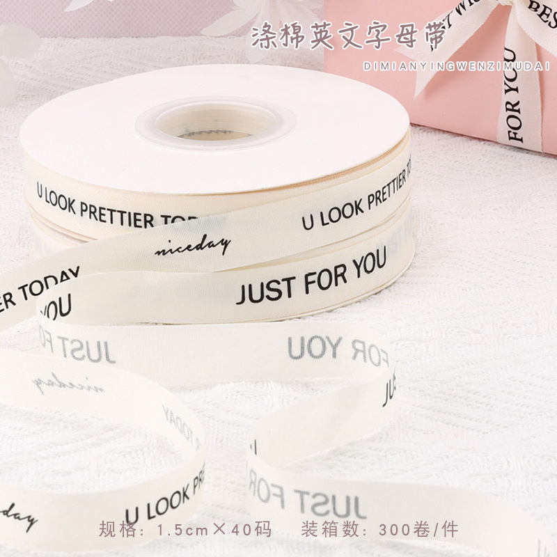 Popular off-white polyester-cotton ribbon with English lettering