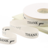 Popular off-white polyester-cotton ribbon with English lettering